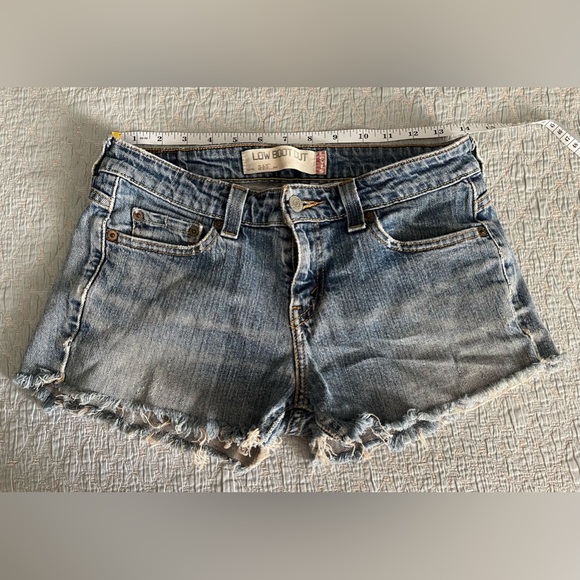 LEVI’S LADIES SZ 4 LOW BOOT CUT JEANS THAT ARE CUTOFF SHORT-SHORTS W/ 28” WAIST - Picture 1 of 8